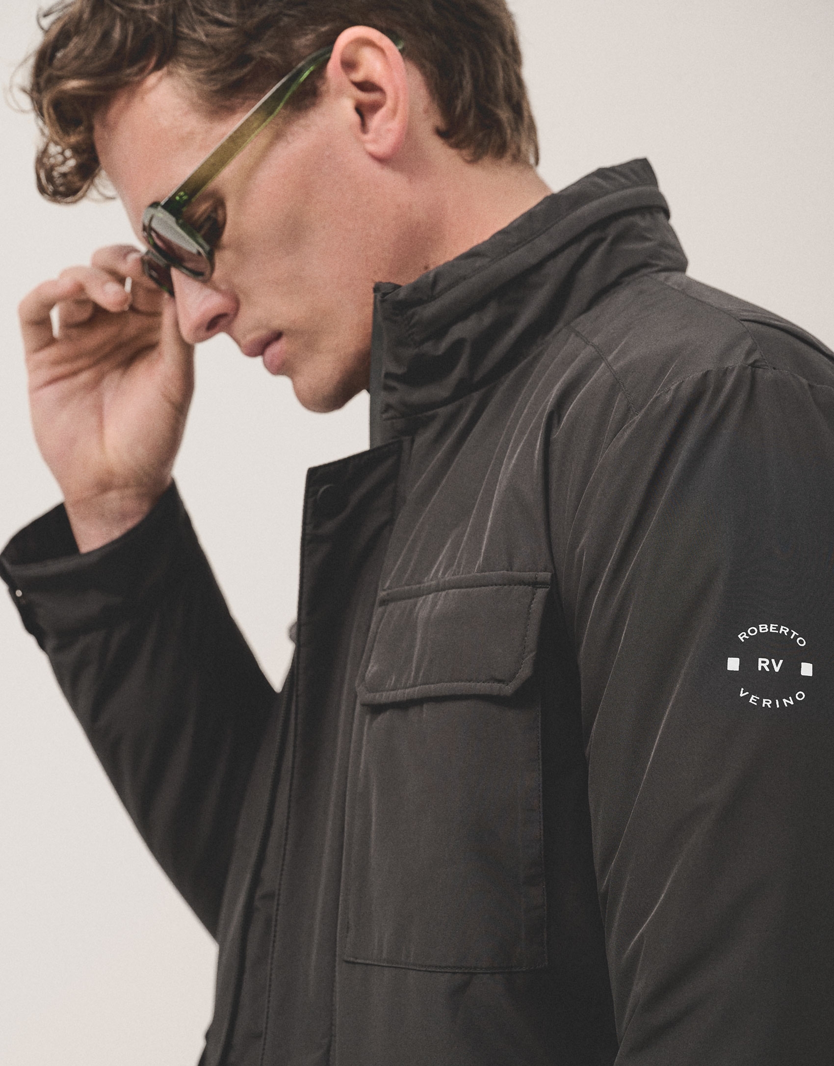 Technical black four-pocket parka