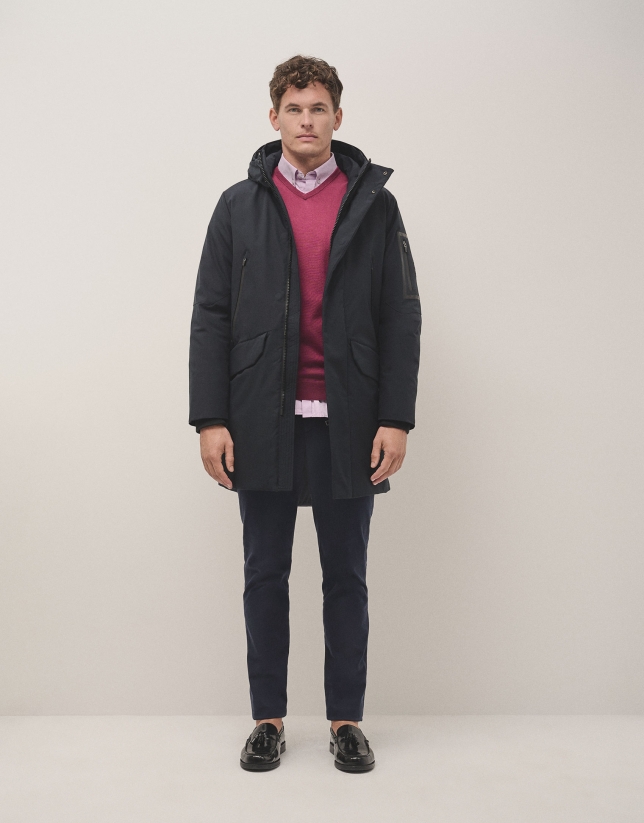 Long navy blue parka with quilted lining