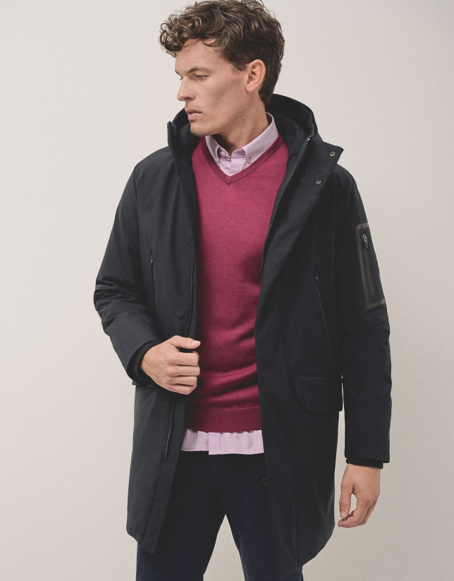 Long navy blue parka with quilted lining