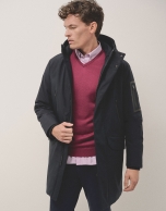 Long navy blue parka with quilted lining