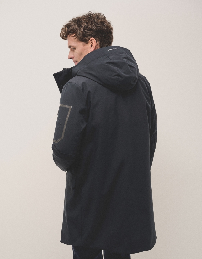 Long navy blue parka with quilted lining