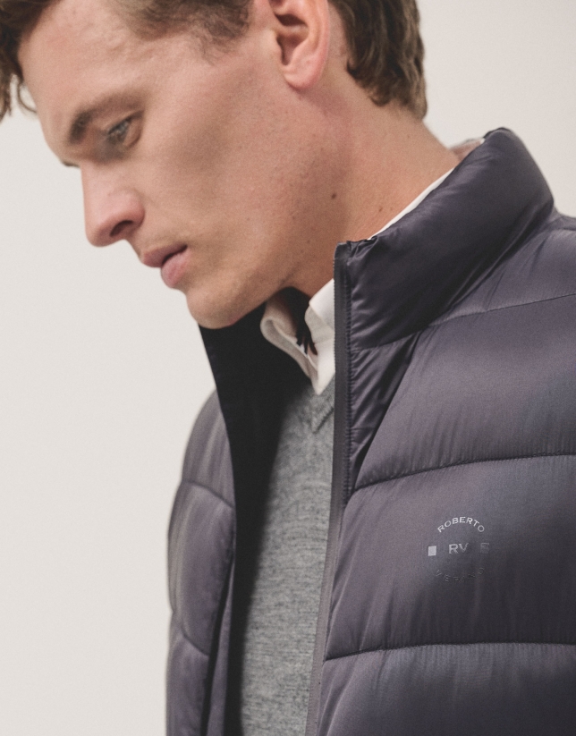 Navy blue quilted technical jacket