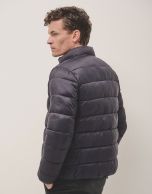 Navy blue quilted technical jacket