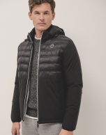 Black technical jacket with quilting