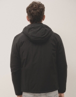 Black technical jacket with quilting