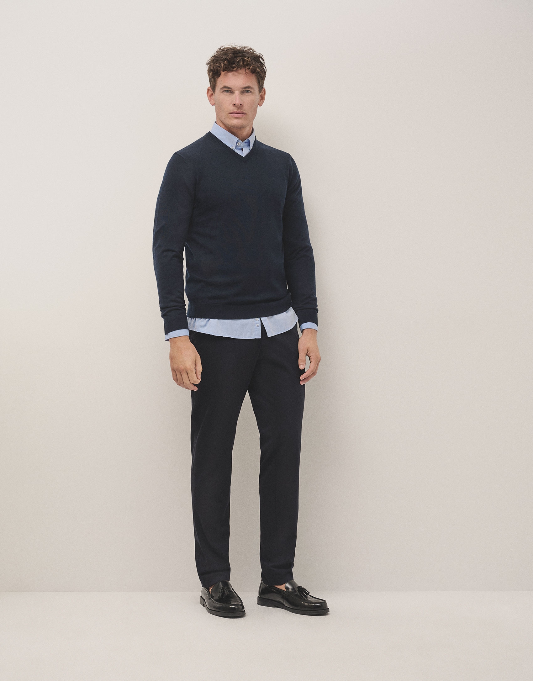 Navy blue wool sweater with V-neck 