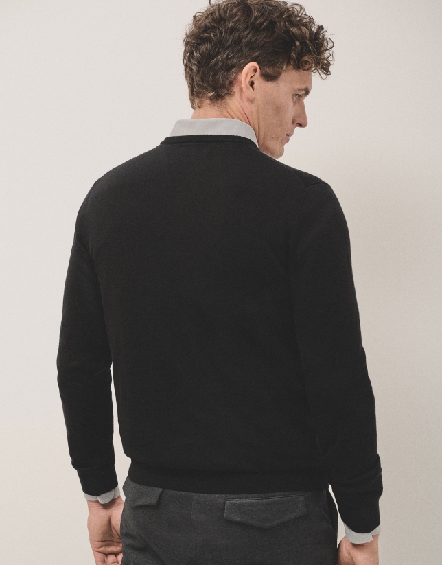 Black wool sweater with V-neck 