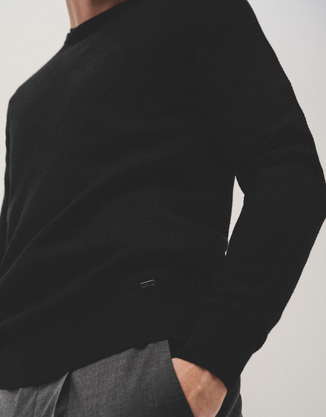 Black structured wool sweater