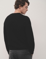 Black structured wool sweater