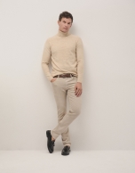 Sand-coloured melange sweater with turtle neck