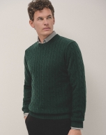 Dark green cable-stitched sweater