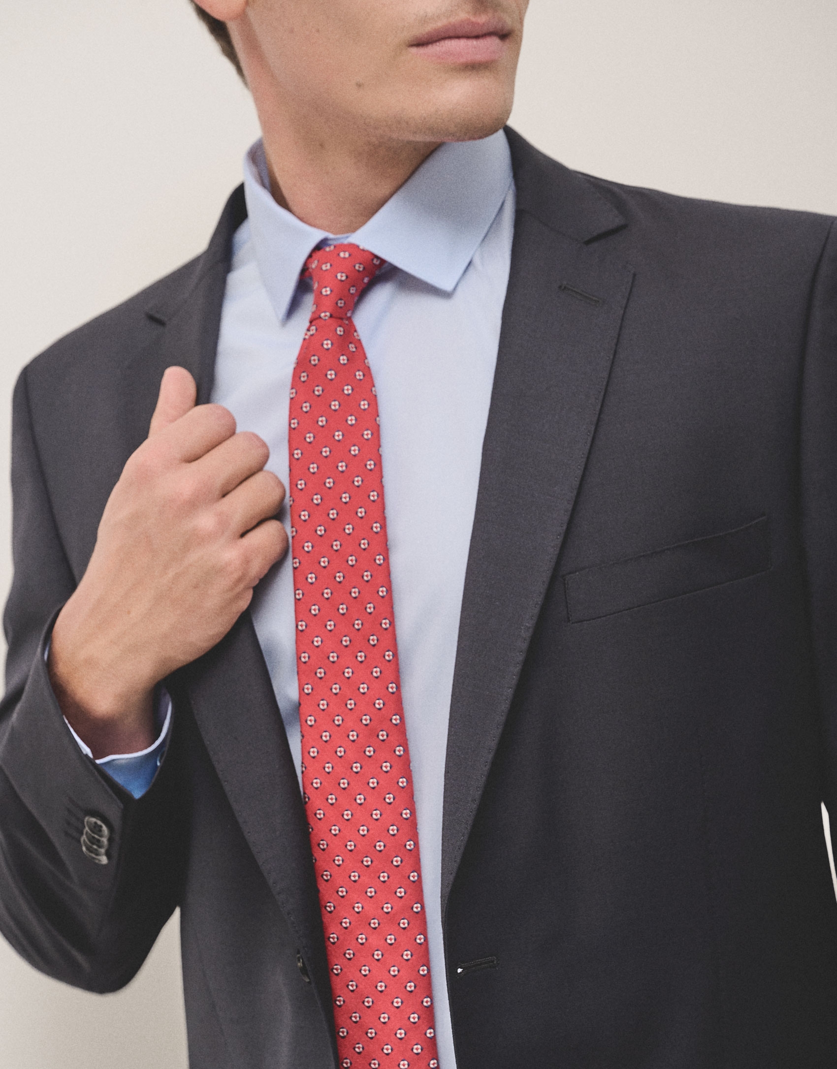 Red silk tie with navy blue jacquard 