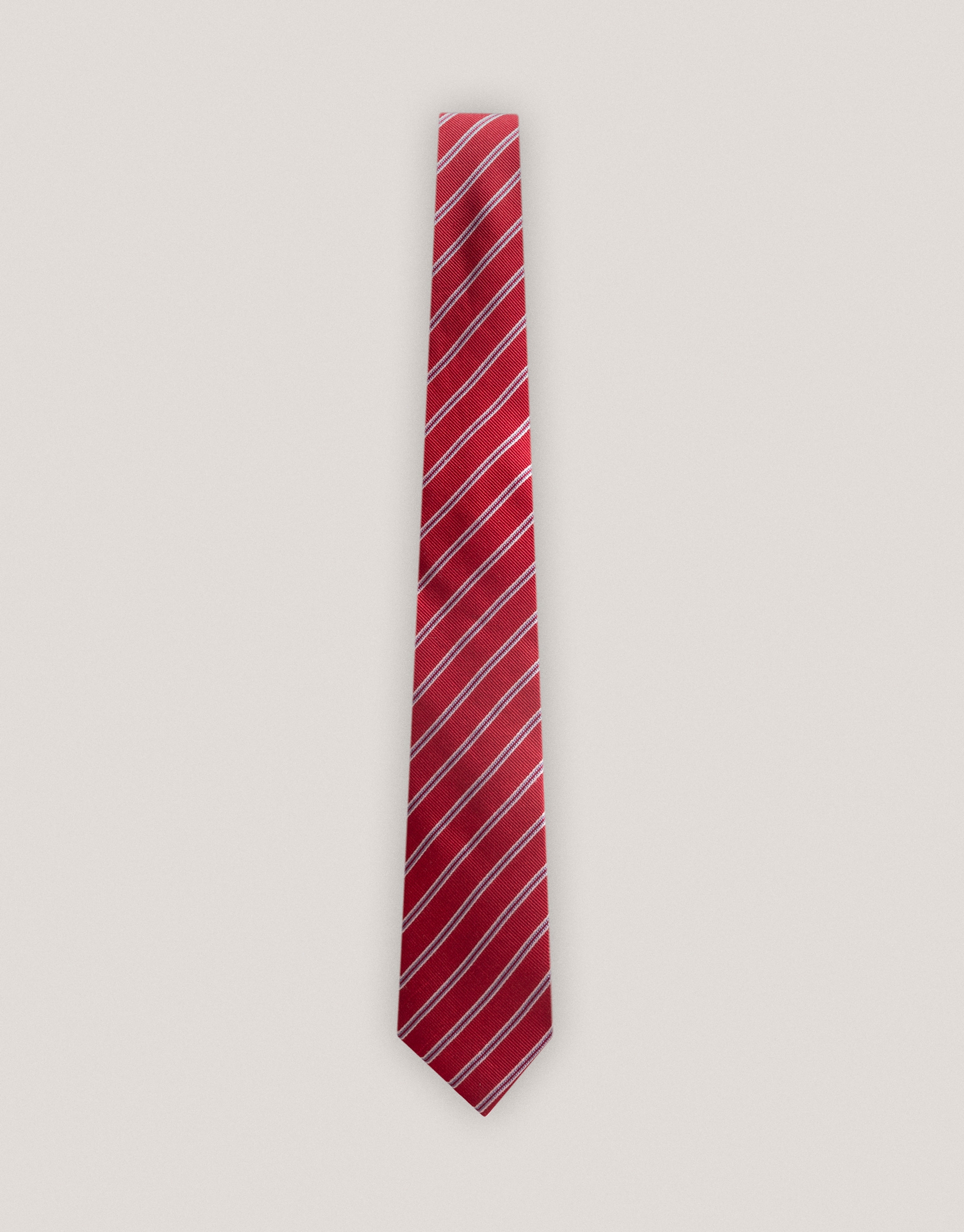 Red silk tie with white stripes