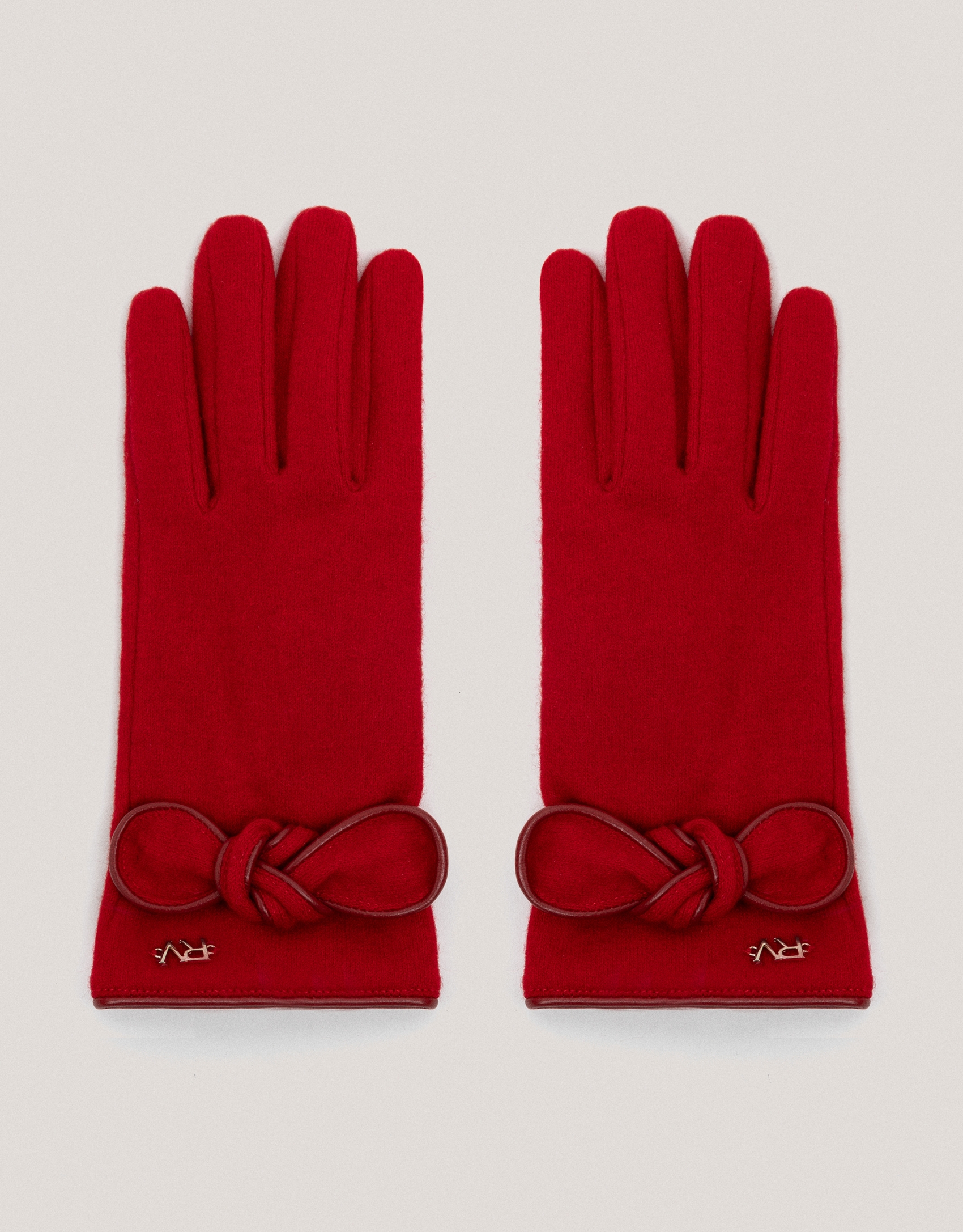 Red wool gloves with a bow