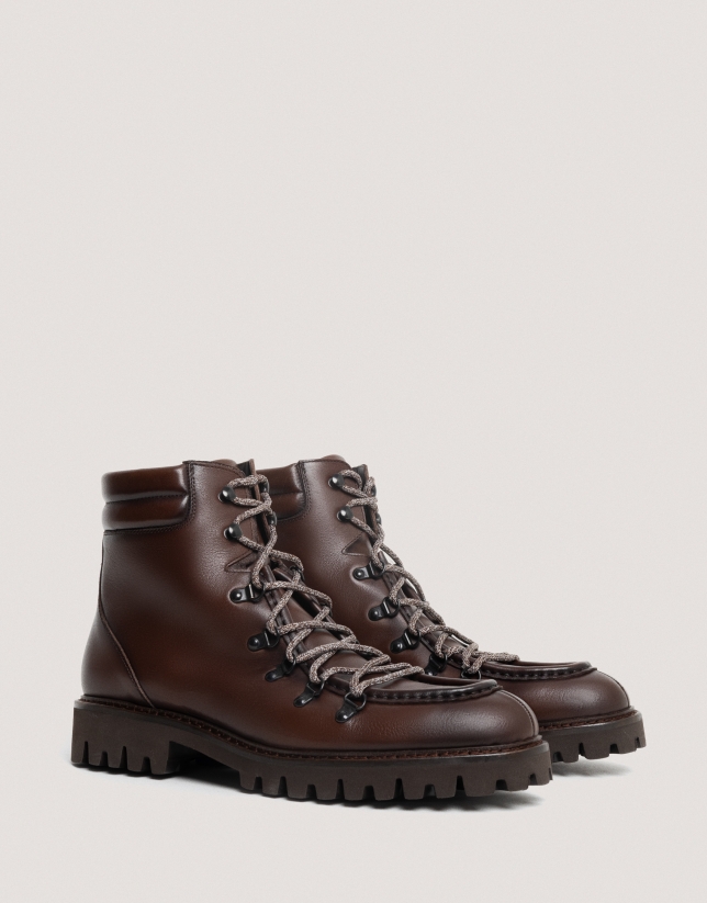 Brown leather boots with shoe laces