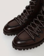 Brown leather boots with shoe laces