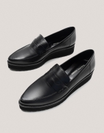 Black leather platform moccasins