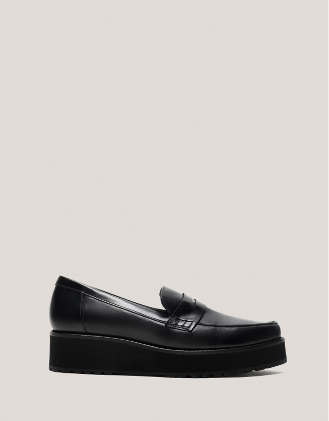 Black leather platform moccasins