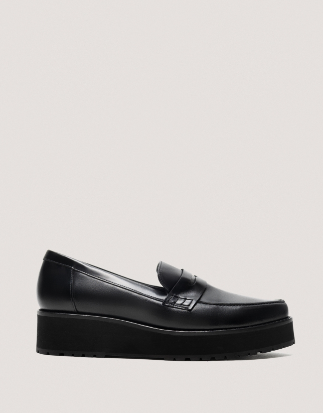 Black leather platform moccasins