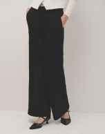 Black straight pants with embossed design