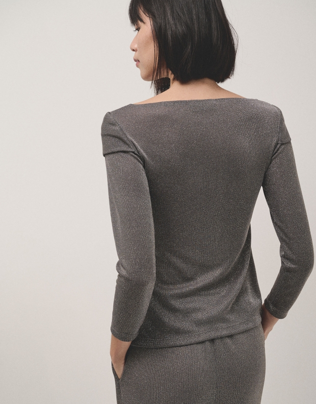 Shiny gray knit top with crossover neckline