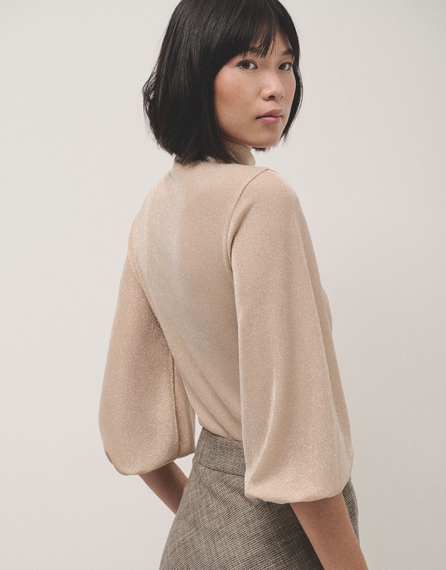 Shiny beige knit top with high collar