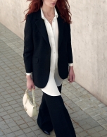 Black blazer with embossed decorative button