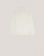 Ivory knit sweater with cable-stitching