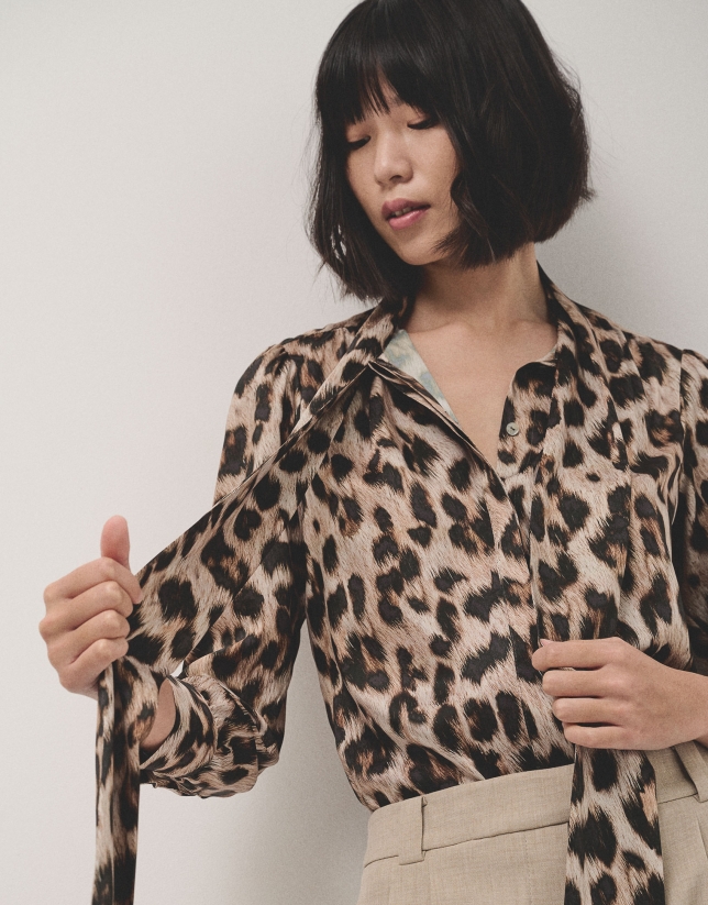 Brown animal print blouse with bow