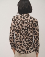 Brown animal print blouse with bow